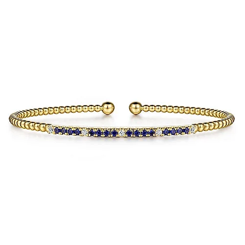 Simple Bangles For Special Occasions-Sapphire and Diamond Bujukan Bangle in Yellow Gold by Gabriel & Co.