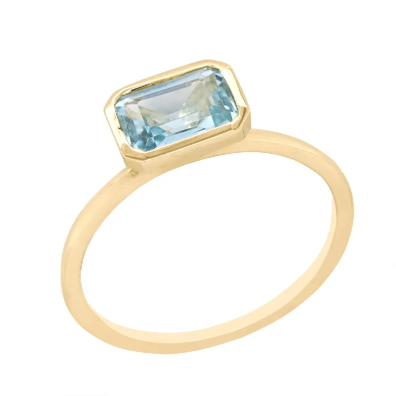 Simple Band Rings For Elegant Style-YELLOW GOLD FASHION RING WITH EMERALD CUT BLUE TOPAZ