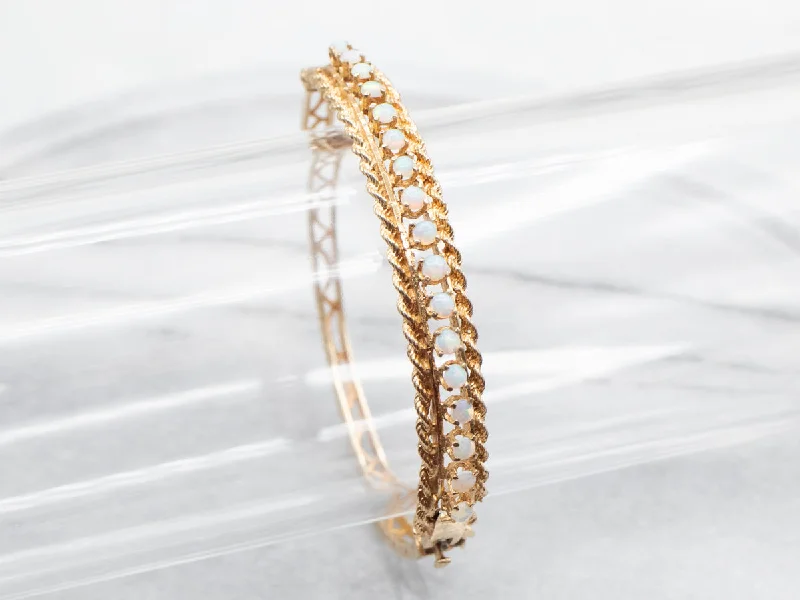 Trendy Bangles For Weddings-Twisting Gold and Opal Bangle Bracelet