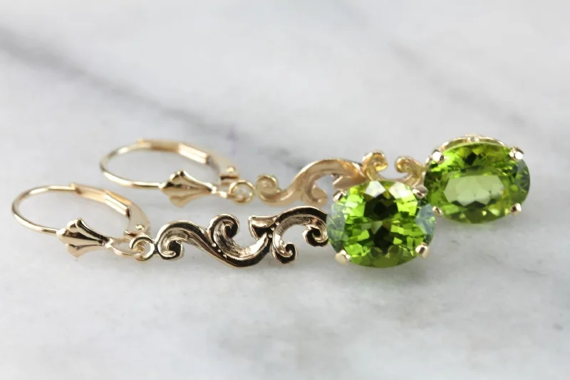 Bold Earrings For Fashion Lovers-Scrolling Bright Green Peridot Drop Earrings